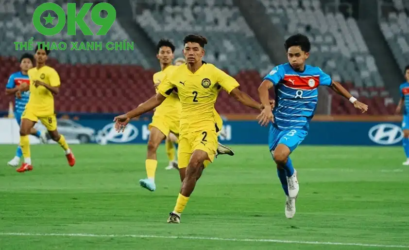 U23 Malaysia (vàng) bất ngờ để thua trước U23 Philippines trong trận mở màn. (Ảnh: Internet) U23 Malaysia (vàng) bất ngờ để thua trước U23 Philippines trong trận mở màn. (Ảnh: Internet)